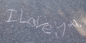 I love you written on the sidewalk in chalk --- Image by © Tomas Rodriguez/Corbis